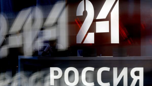 Logo de Rossiya 24 - Sputnik Mundo