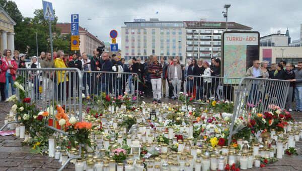 Homenaje de las víctimas del atentado en la ciudad Turku, Finlandia - Sputnik Mundo