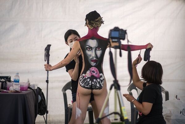 Pintura corporal: los cuerpos se convierten en lienzos en un festival surcoreano - Sputnik Mundo