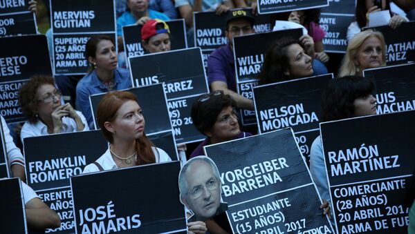 Manifestación en Caracas, Venezuela, por los fallecidos durante las protestas de los últimos meses - Sputnik Mundo