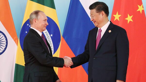 El presidente de Rusia, Vladímir Putin, y el presidente de China, Xi Jiping - Sputnik Mundo