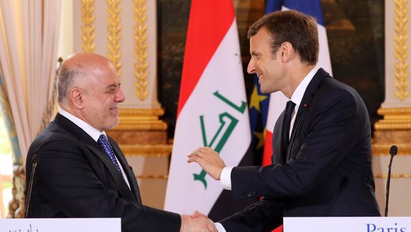Primer ministro de Irak, Haider Abadi, y presidente de Francia, Emmanuel Macron - Sputnik Mundo