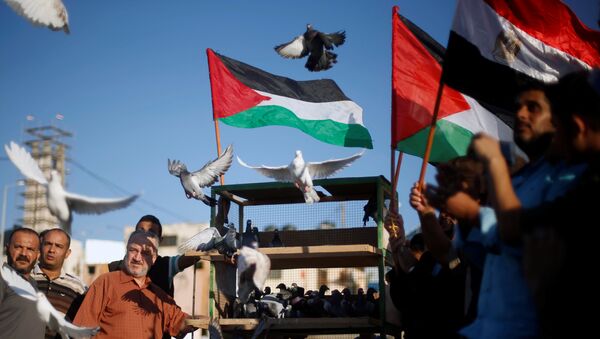 Los palestinos celebran la reconciliación entre Hamás y Al Fatah - Sputnik Mundo