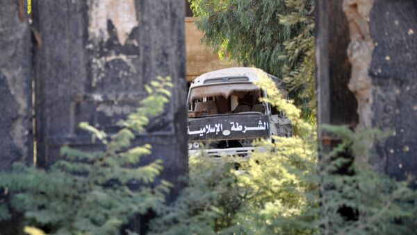 Un vehículo de Daesh abandonado en la ciudad siria de Mayadin - Sputnik Mundo