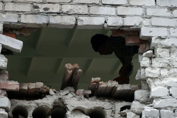 Las consecuencias del bombardeo de Donetsk por los militares ucranianos - Sputnik Mundo
