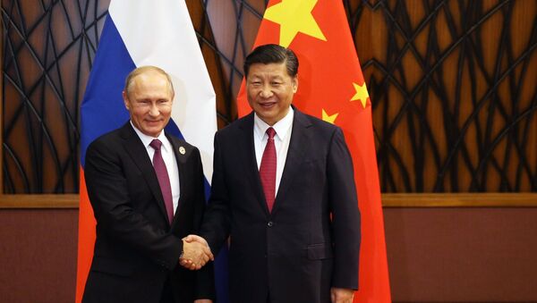 El presidente de Rusia, Vladímir Putin, y el presidente de China, Xi Jinping (archivo) - Sputnik Mundo