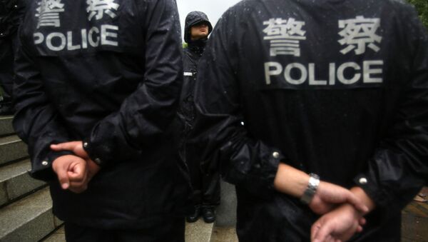 Policía de China (archivo) - Sputnik Mundo