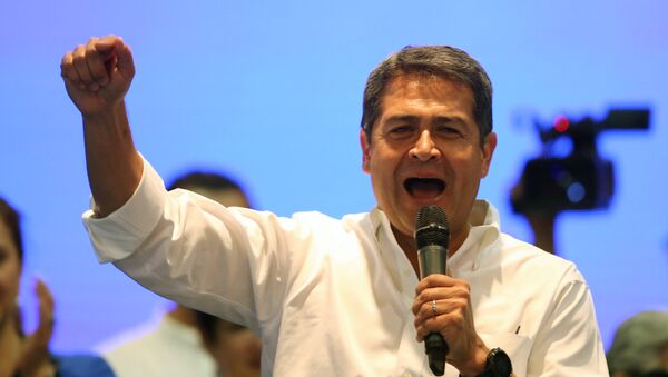 Honduras President and National Party candidate Juan Orlando Hernandez - Sputnik Mundo