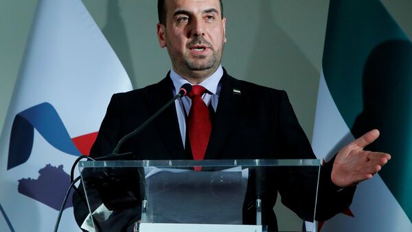 Jefe de la delegación opositora siria en las consultas de Ginebre, Naser Hariri - Sputnik Mundo