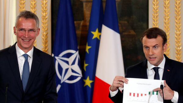 El secretario general de la OTAN, Jens Stoltenberg y el presidente de Francia, Emmanuel Macron - Sputnik Mundo