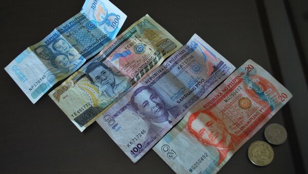Pesos filipinos - Sputnik Mundo