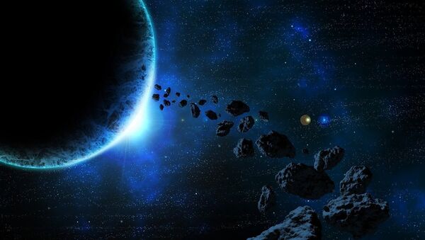 Asteroides (imagen referencial) - Sputnik Mundo