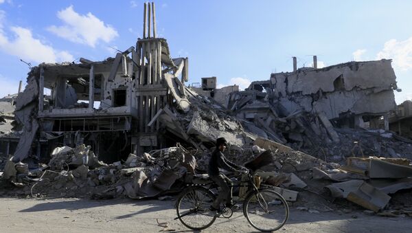 Edificios destruidos en Al Raqa, Siria, tras una operación apoyada por los aviones de EEUU - Sputnik Mundo