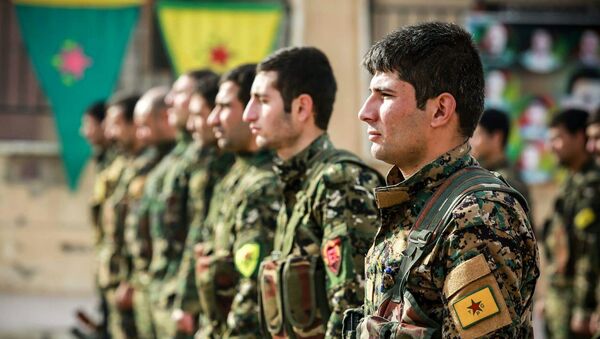 Los combatientes de las Unidades kurdas de Protección Popular (YPG) (archivo) - Sputnik Mundo
