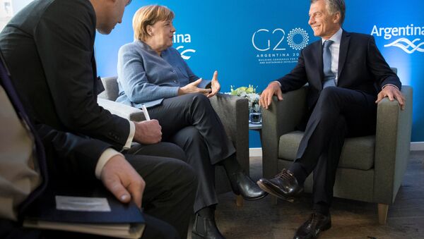 El presidente de Argentina, Mauricio Macri, y la canciller de Alemania, Angela Merkel - Sputnik Mundo