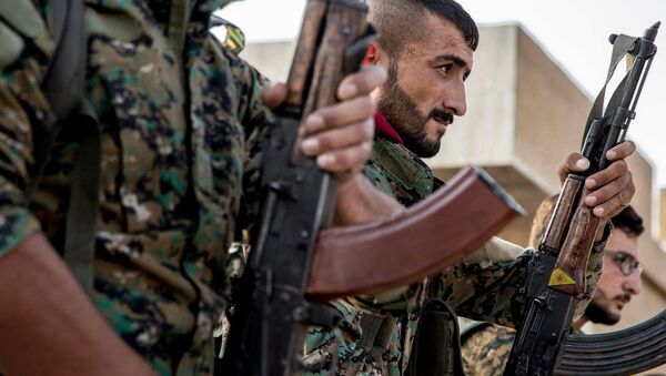 Los combatientes kurdos (imagen referencial) - Sputnik Mundo