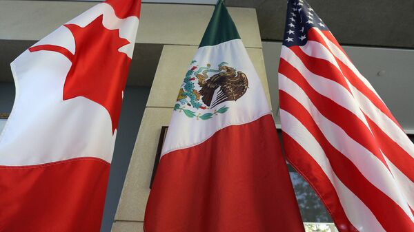 Las banderas de Canadá, México y EEUU (archivo) - Sputnik Mundo