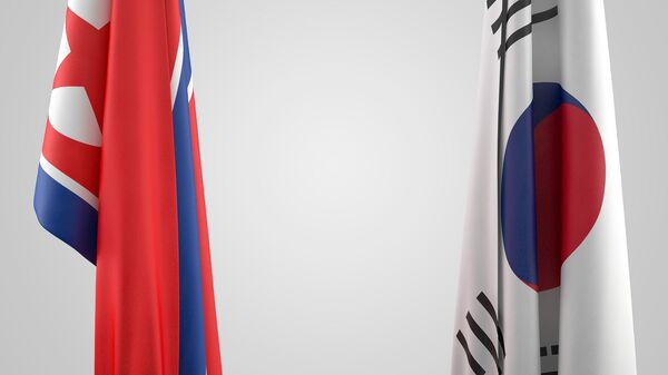 Las banderas de Corea del Norte y Corea del Sur (imagen referencial) - Sputnik Mundo