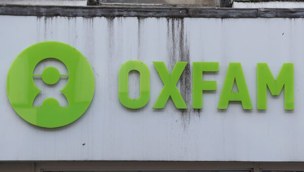 Logo de Oxfam - Sputnik Mundo