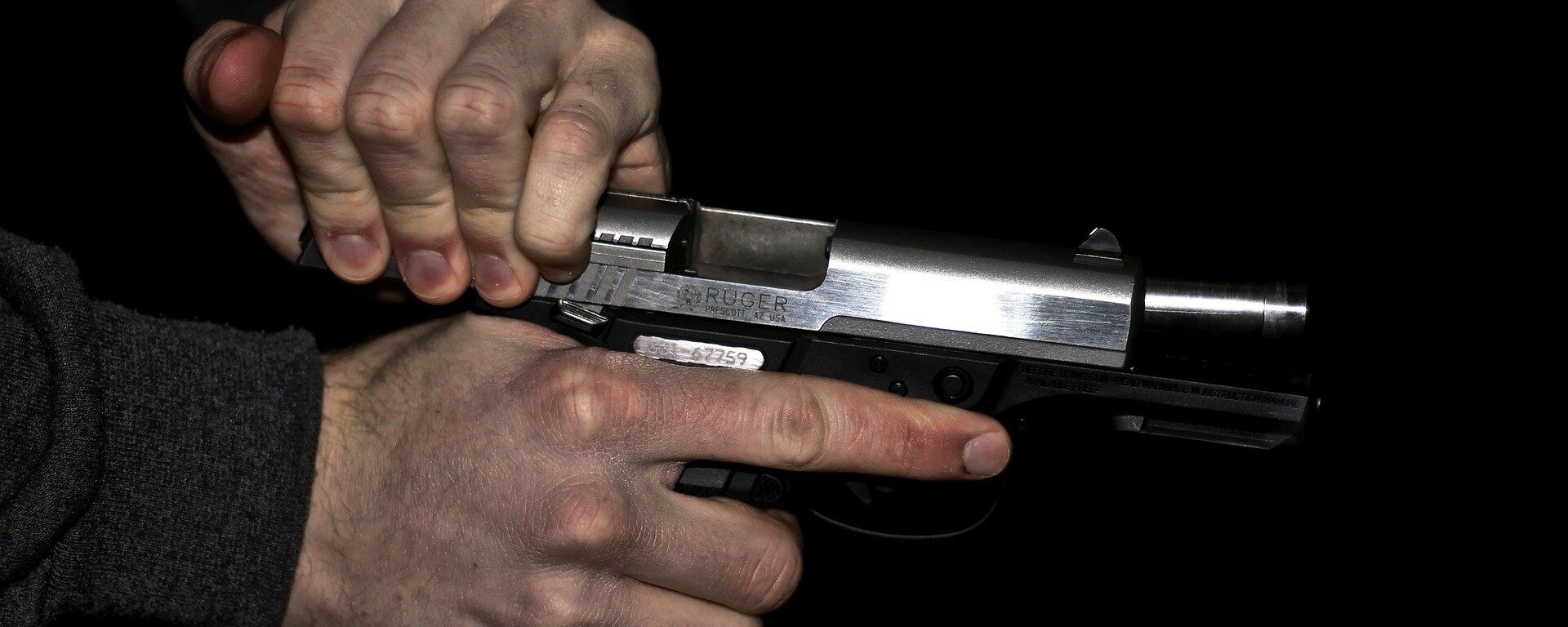 Una pistola (imagen referencial) - Sputnik Mundo, 1920, 21.02.2021