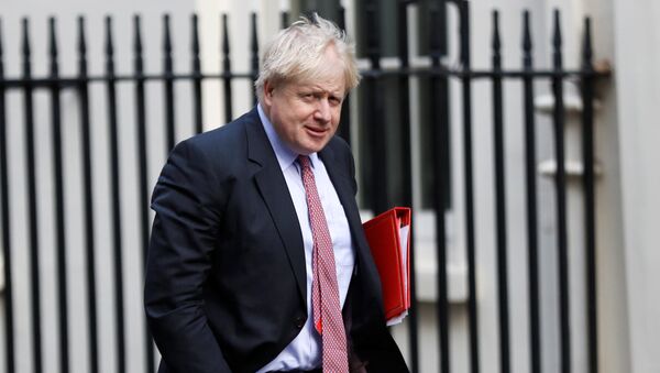 Canciller del Reino Unido, Boris Johnson, llega a Downing Street en Londres - Sputnik Mundo