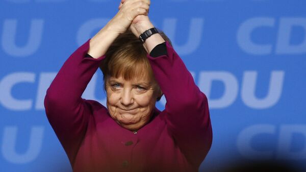 Канцлер Германии Ангела Меркель после выступления на партийном съезде Христианско-демократического союза в Германии в Берлине, Германия - Sputnik Mundo