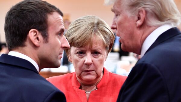 El presidente francés, Emmanuel Macron; la canciller alemana, Angela Merkel, y el presidente estadounidense, Donald Trump - Sputnik Mundo