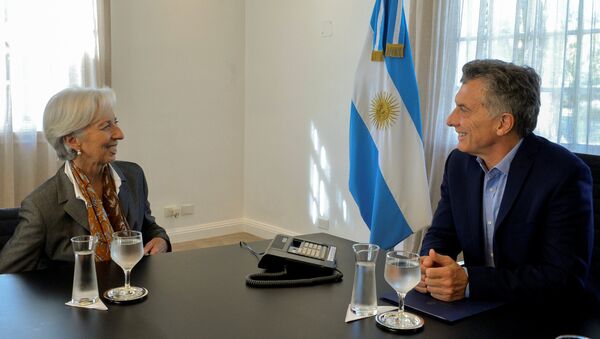 El presidente de Argentina, Mauricio Macri, junto a la directora del Fondo Monetario Internacional, Christine Lagarde - Sputnik Mundo