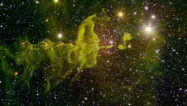 Una imagen de la nebulosa IC 417 sacada por el telescopio espacial Spitzer (archivo) - Sputnik Mundo