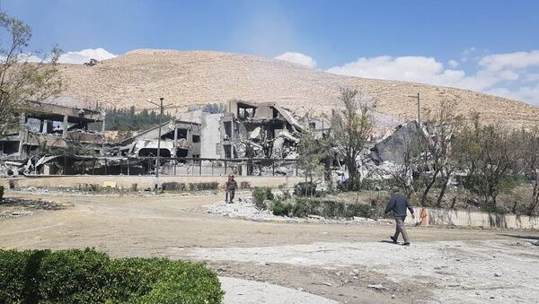 Las consecuencias del bombardeo del municipio de Barzeh - Sputnik Mundo