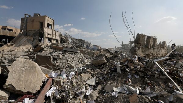 Consecuencias del bombardeo en Damasco, Siria - Sputnik Mundo