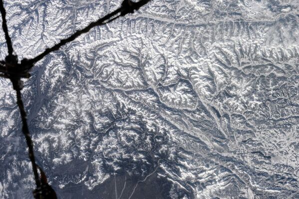 La Tierra, vista desde la ventana de la Estación Espacial Internacional - Sputnik Mundo