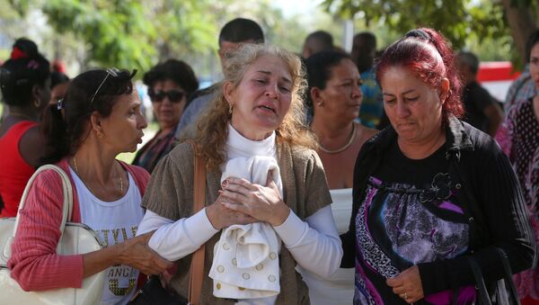 Familiares de las víctimas del estrello del avión Boeing 737 en Cuba - Sputnik Mundo