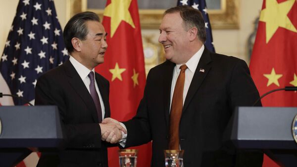 Wang Yi, canciller de China y Mike Pompeo, secretario de Estado de EEUU - Sputnik Mundo