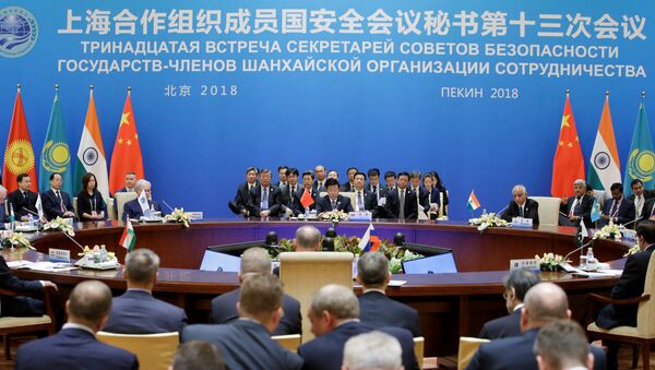 La delegación china durante la reunión de la OCS - Sputnik Mundo