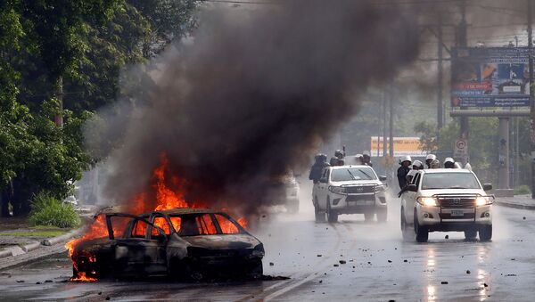Policía durante protestas en Nicaragua - Sputnik Mundo