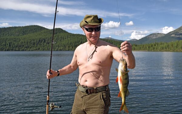 Vladímir Putin durante las vacaciones en la República Tuvá de Rusia en 2017 - Sputnik Mundo