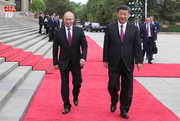 Reuniones oficiales y otras más distendidas de Vladímir Putin en China - Sputnik Mundo