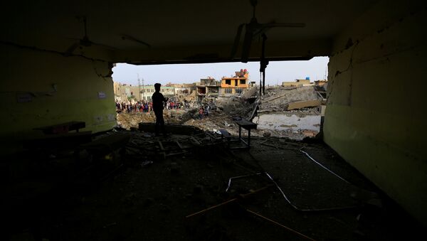 La zona afectada por la explosión en Bagdad, Irak - Sputnik Mundo