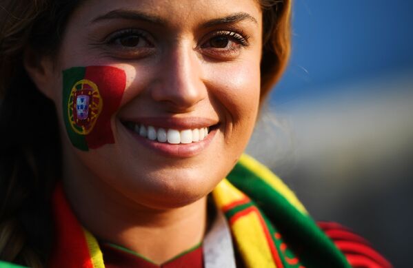 A fan of the Portuguese national team before the start of a group stage match between Portugal and Spain. - Sputnik Mundo