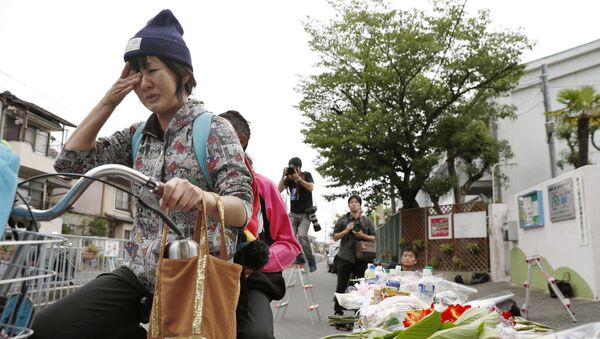 Los japoneses homenajean víctimas del terremoto - Sputnik Mundo
