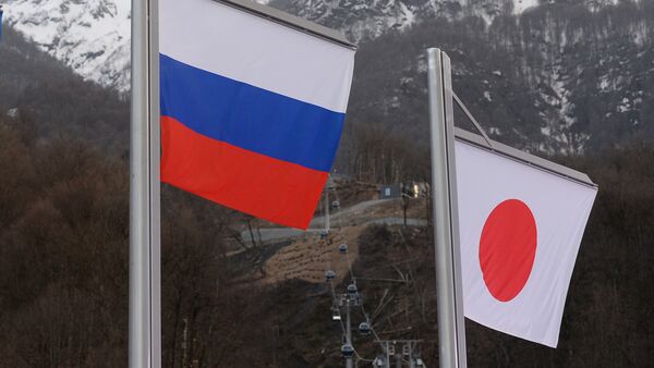Banderas de Rusia y Japón - Sputnik Mundo