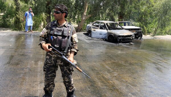 Policía en el lugar del ataque en Jalalabad, Afganistán - Sputnik Mundo