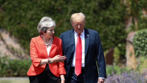La primera ministra del Reino Unido, Theresa May y el presidente de EEUU, Donald Trump - Sputnik Mundo