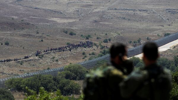 Soldados israelíes en los Altos del Golán, en la frontera entre Siria e Israel - Sputnik Mundo