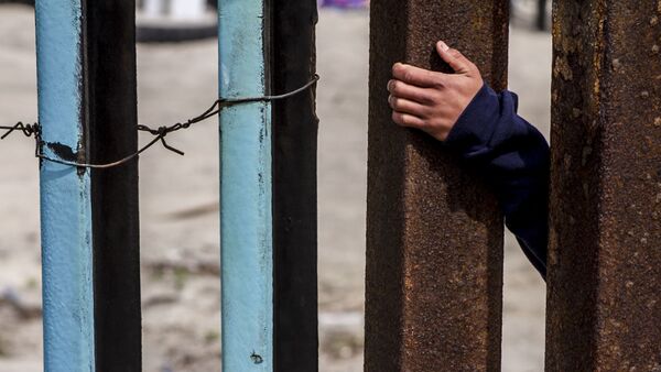 Migrante del lado estadounidense de la frontera con México - Sputnik Mundo