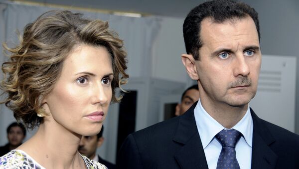 Asma Asad, primera dama siria, al lado de su marido, el presidente Bashar Asad - Sputnik Mundo