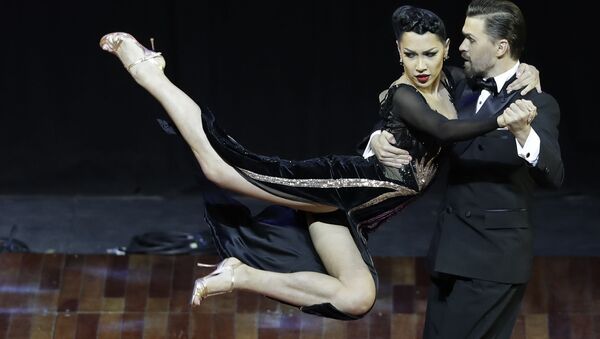 Российска пара Дмитрий Васин и Согдиана Хамзина во время выступления на Чемпионате мира по танго в Аргентине  - Sputnik Mundo