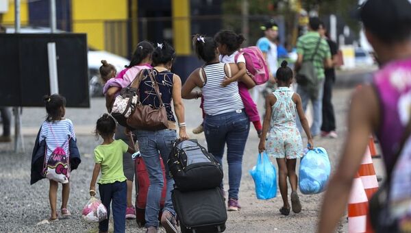 Los inmigrantes venezolanos - Sputnik Mundo