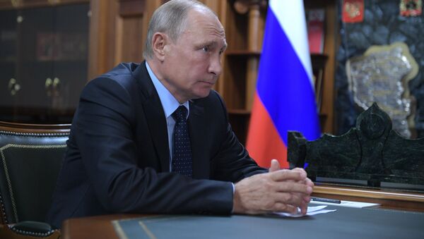 Vladímir Putin, presidente de Rusia durante su viaje de trabajo a Kémerovo - Sputnik Mundo